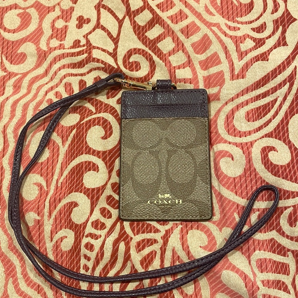 Brand new, never used Coach badge holder.